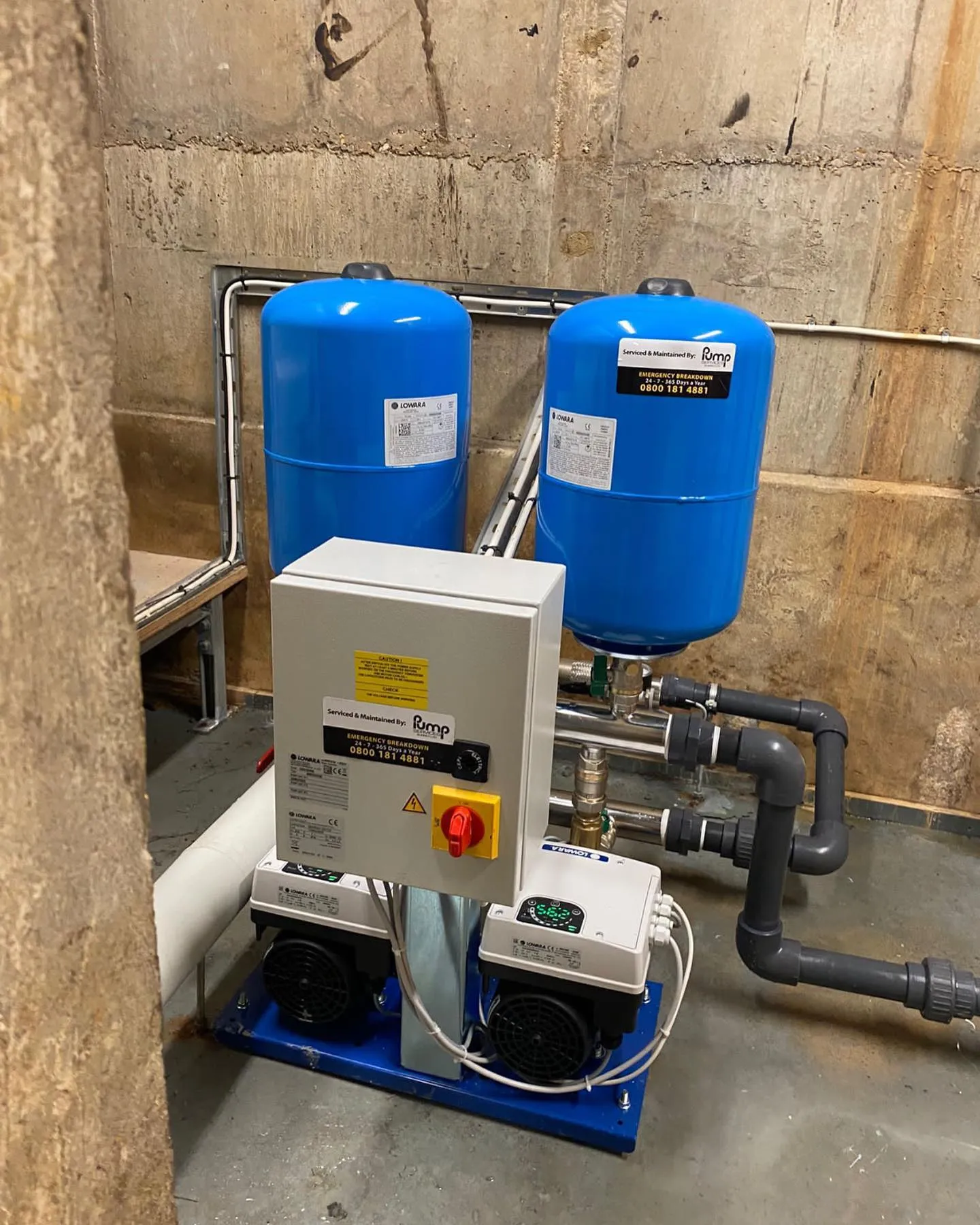 A couple of blue tanks sitting next to each other.