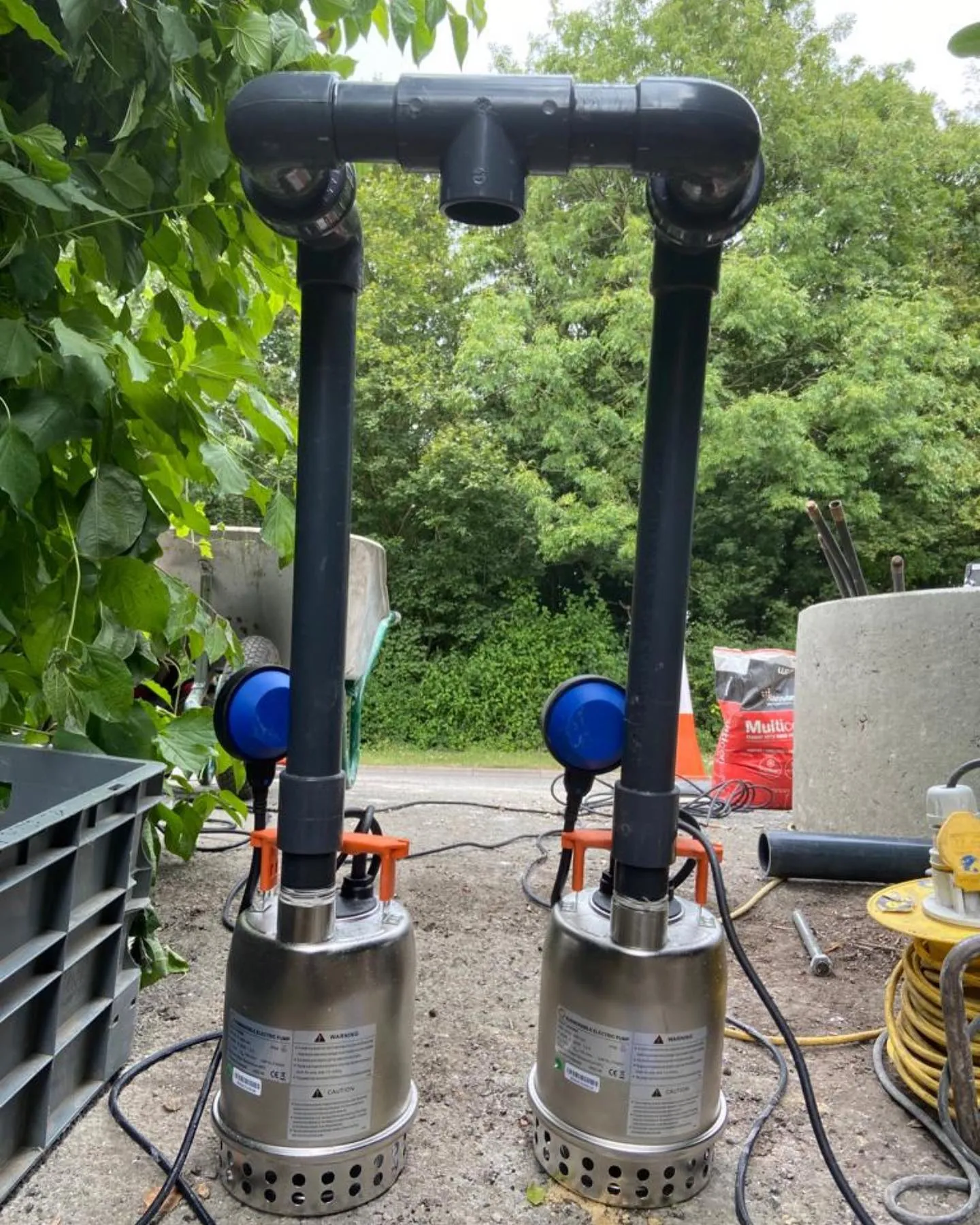 A couple of pumps sitting next to each other.
